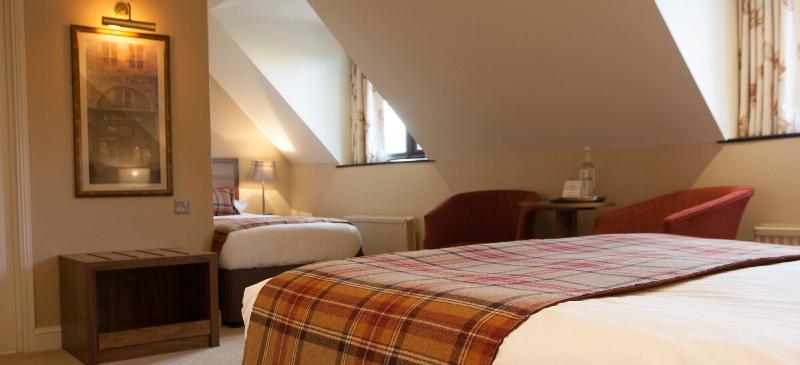 Stirrups Hotel - Oda