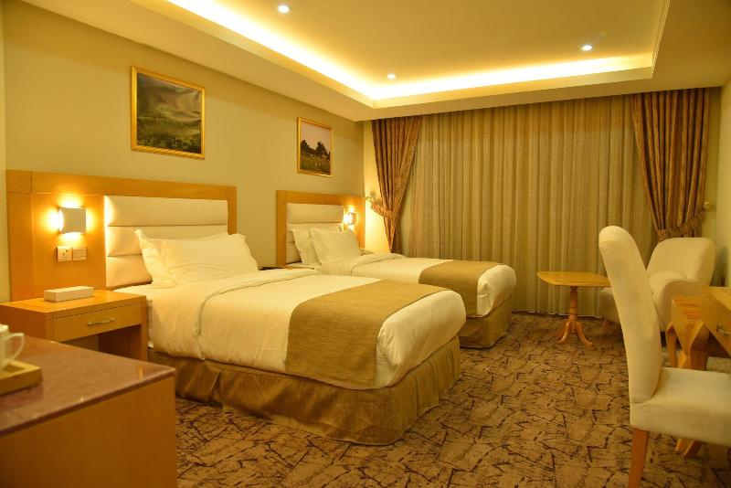 The Muscat Plaza Hotel - Oda