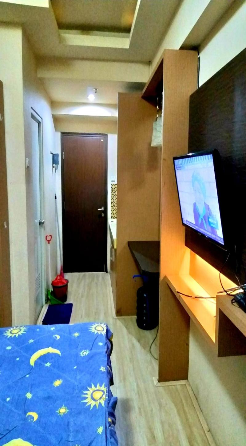 The Suites Metro Apartment Desta Farispro by ZUZU - Oda