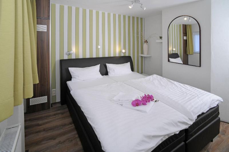Le petit Palais – Hotel & Ferienapartments - Oda