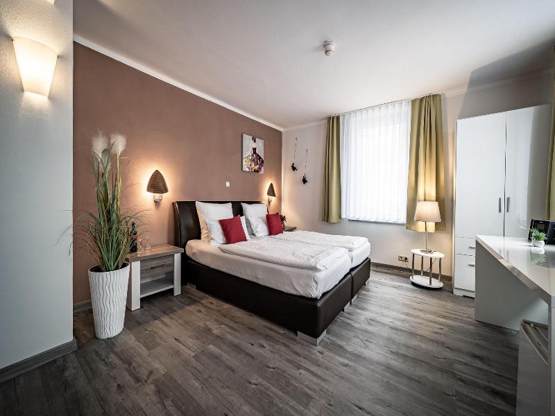 Le petit Palais – Hotel & Ferienapartments - Oda