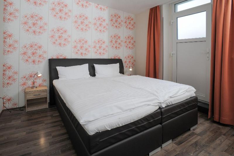 Le petit Palais – Hotel & Ferienapartments - Oda