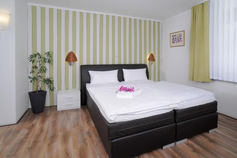 Le petit Palais – Hotel & Ferienapartments - Oda