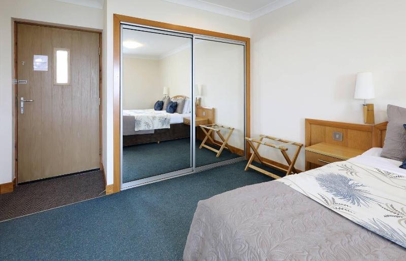 Woodland Bay Hotel - Oda