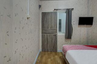 Super OYO 3198 Sukomanunggal Inn fotoÄŸrafÄ±