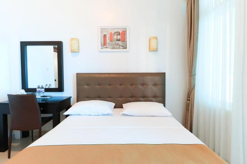 Ge JacMart Homestay Makassar by ZUZU - Oda