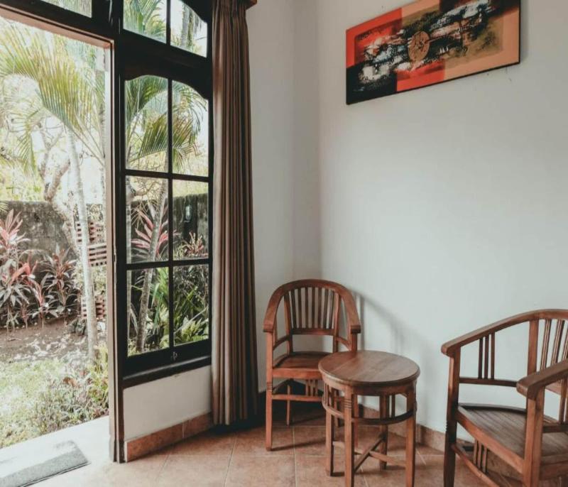 Sekar Arum Riverside Resort in Canggu by ZUZU - Oda
