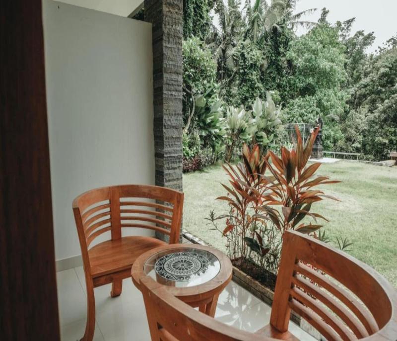 Sekar Arum Riverside Resort in Canggu by ZUZU - Oda