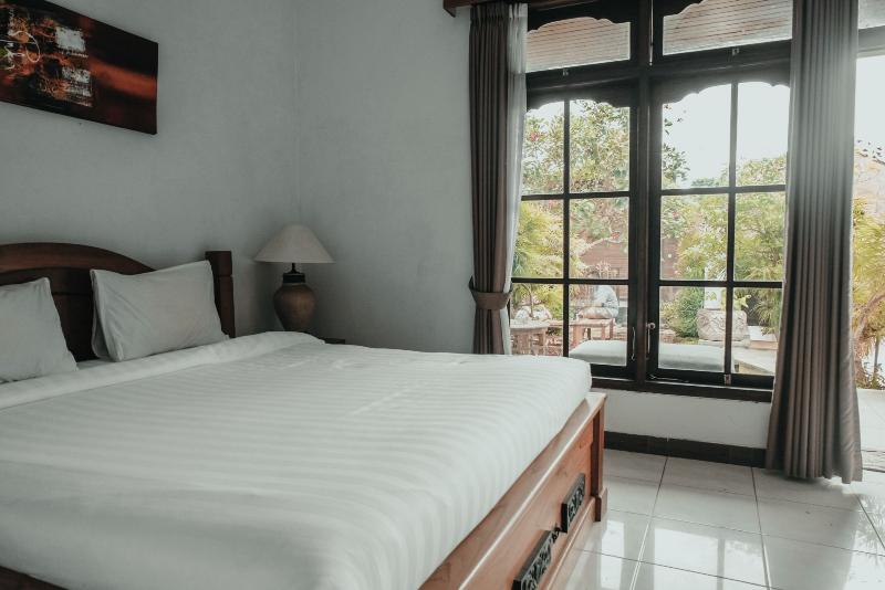 Sekar Arum Riverside Resort in Canggu by ZUZU - Oda