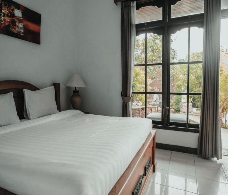 Sekar Arum Riverside Resort in Canggu by ZUZU - Oda