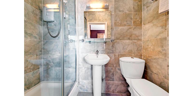 OYO Bostons Manor Hotel - Oda