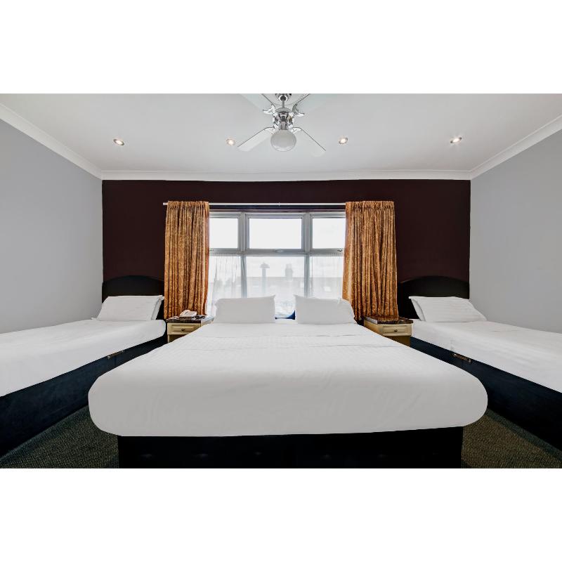 OYO Bostons Manor Hotel - Oda