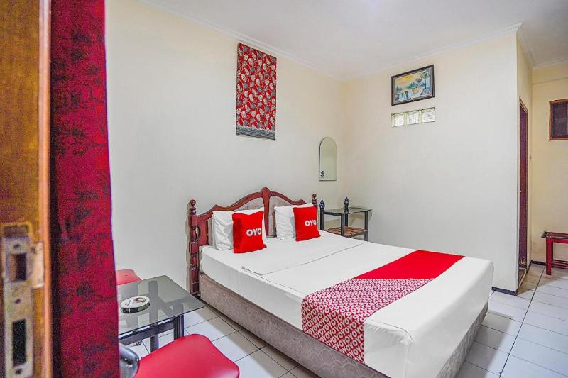 OYO 90132 Lie Mas Hotel - Oda