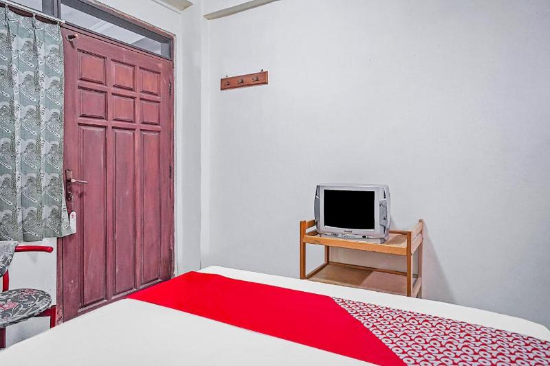 OYO 90132 Lie Mas Hotel - Oda