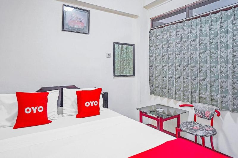 OYO 90132 Lie Mas Hotel - Oda