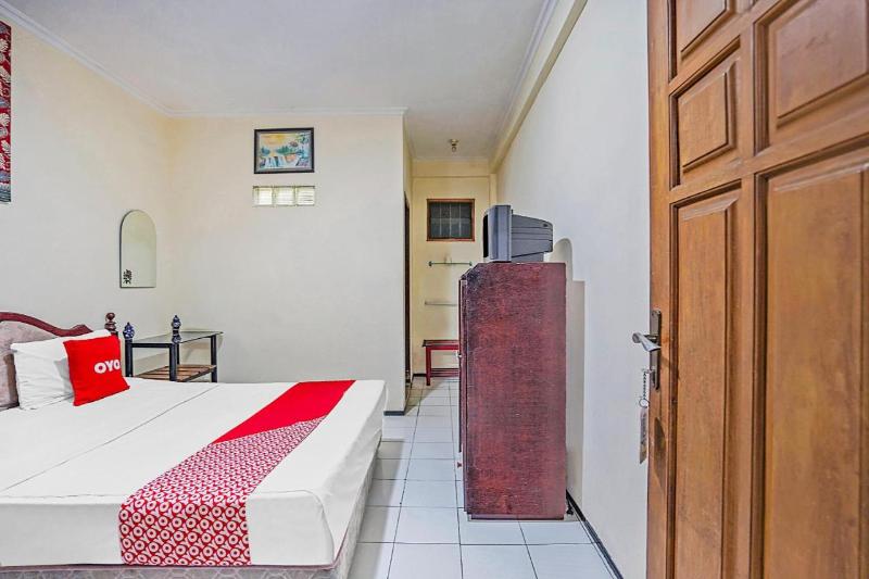 OYO 90132 Lie Mas Hotel - Oda
