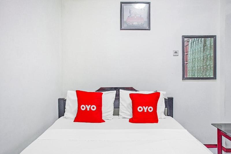 OYO 90132 Lie Mas Hotel - Oda