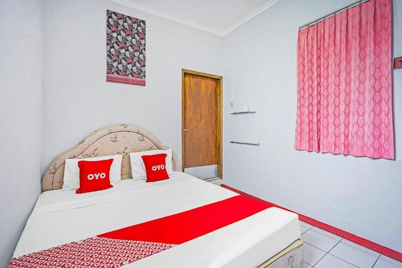 OYO 90132 Lie Mas Hotel - Oda