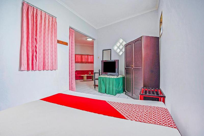 OYO 90132 Lie Mas Hotel - Oda
