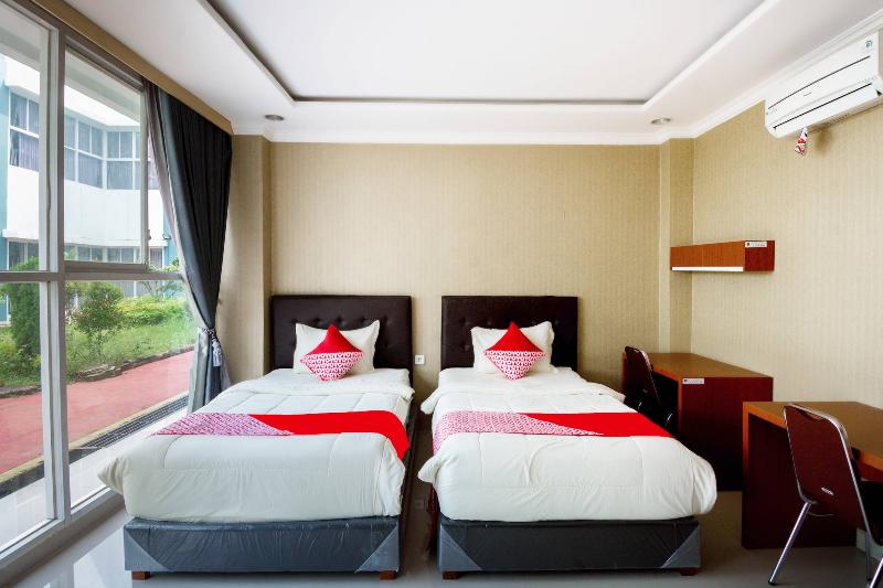 Super OYO 3431 Alpha Hotel Syariah - Oda