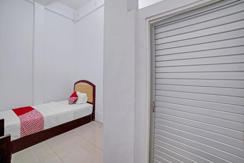 OYO 90387 Sepakat Guest House - Oda