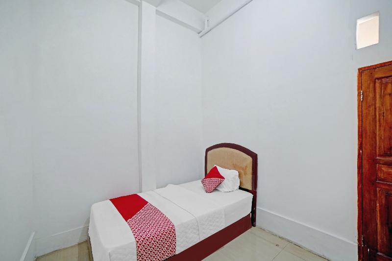 OYO 90387 Sepakat Guest House - Oda