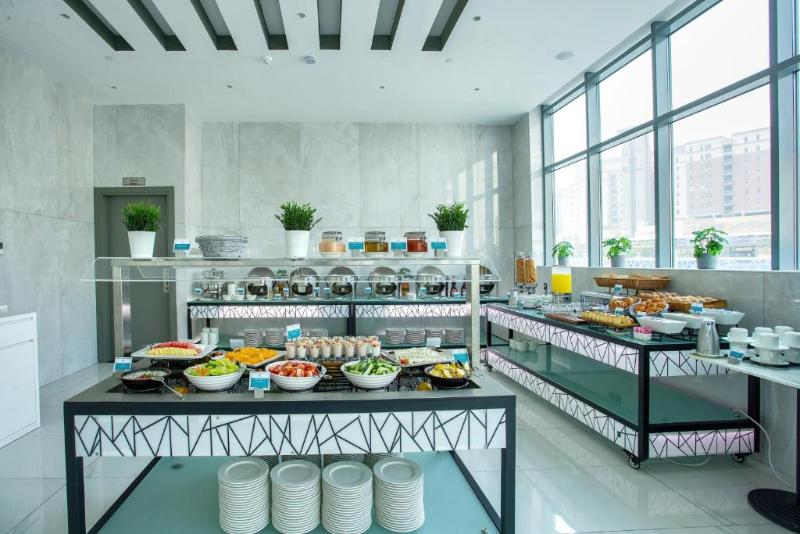 City Avenue Al Reqqa Hotel - Restoran