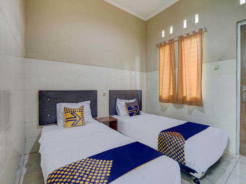 SPOT ON 90159 Puri Asoka Guest House - Oda