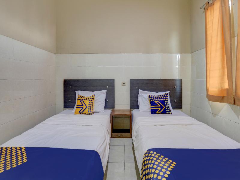 SPOT ON 90159 Puri Asoka Guest House - Oda
