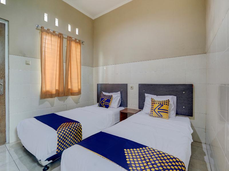 SPOT ON 90159 Puri Asoka Guest House - Oda