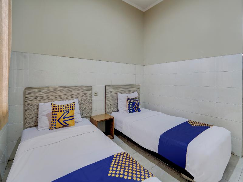 SPOT ON 90159 Puri Asoka Guest House - Oda
