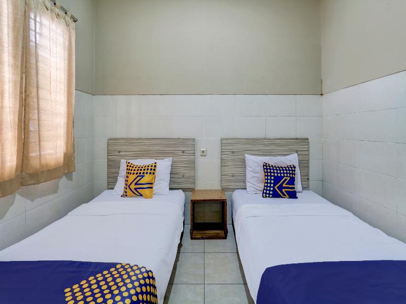 SPOT ON 90159 Puri Asoka Guest House - Oda