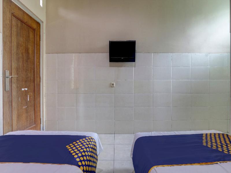 SPOT ON 90159 Puri Asoka Guest House - Oda