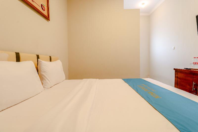 Guesthouse Nusa Indah Syariah 2 by ZUZU - Oda
