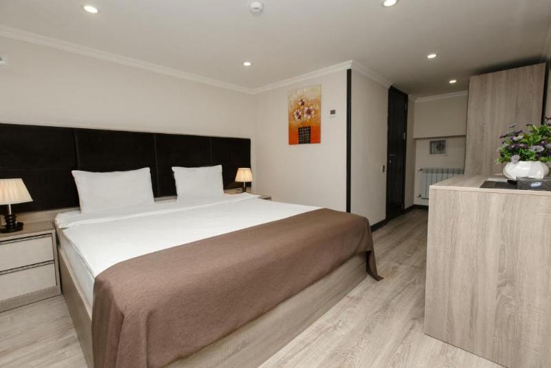 Deluxe City Hotel - Oda