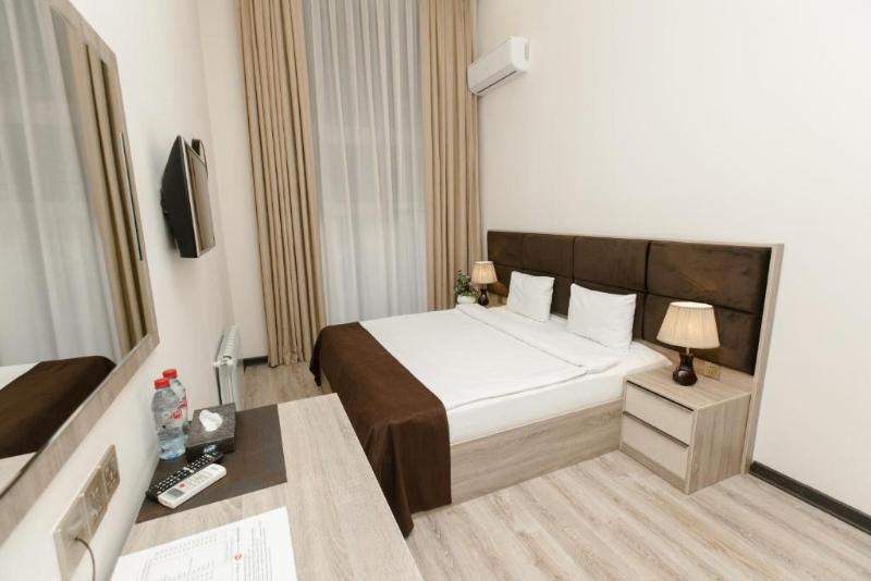 Deluxe City Hotel - Oda