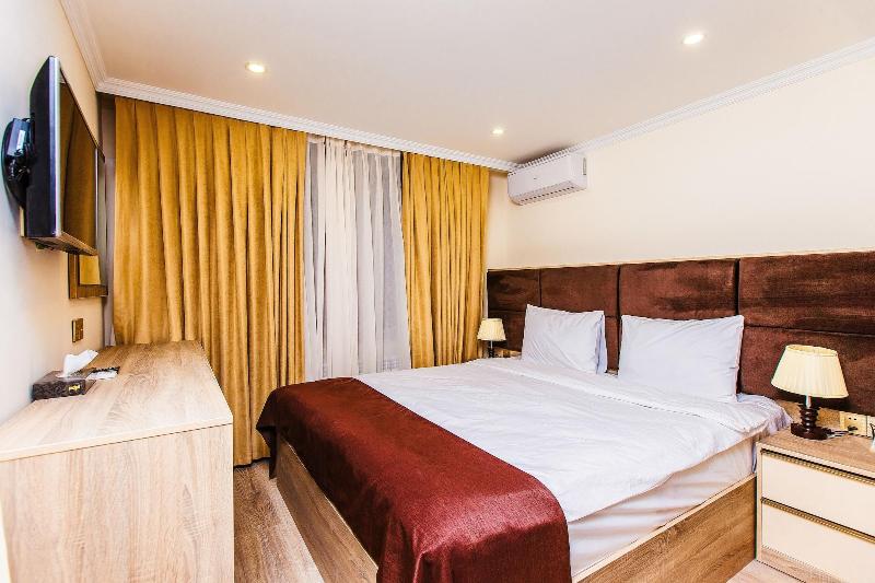 Deluxe City Hotel - Oda