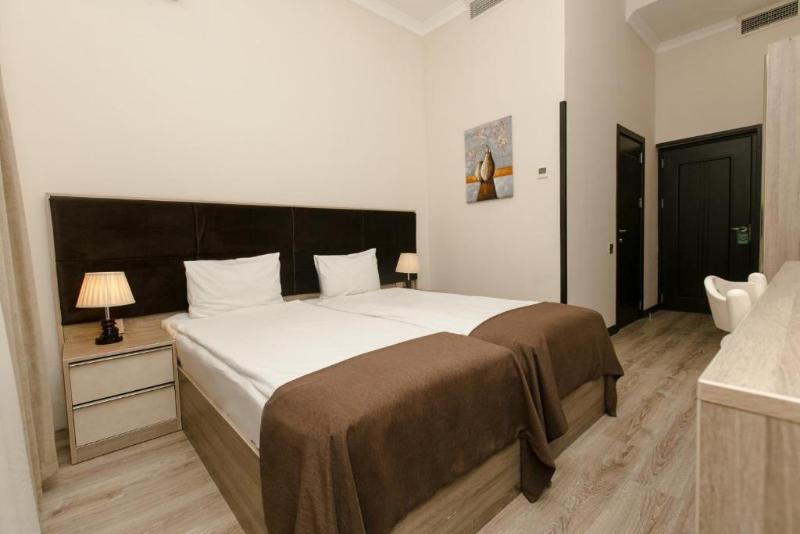 Deluxe City Hotel - Oda