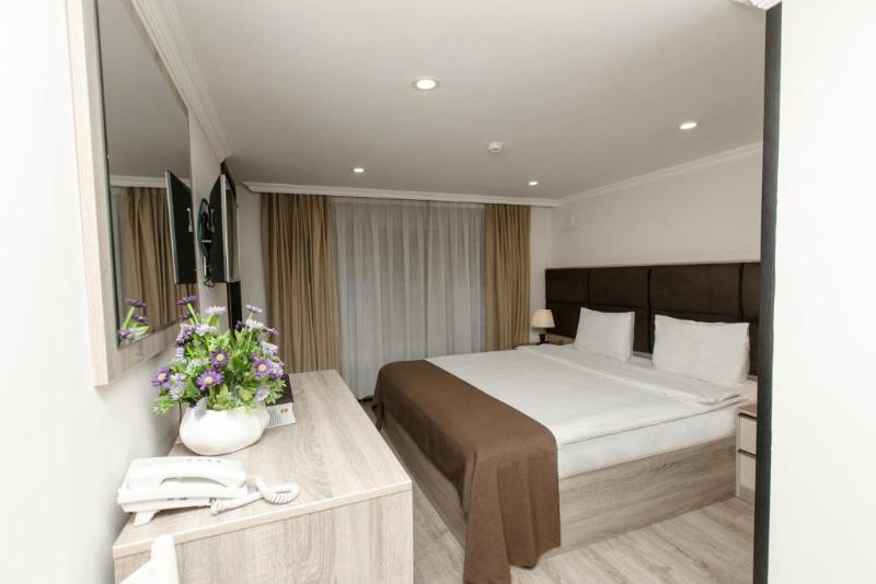 Deluxe City Hotel - Oda