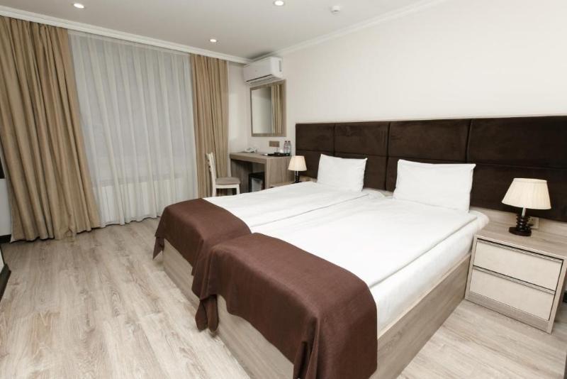 Deluxe City Hotel - Oda