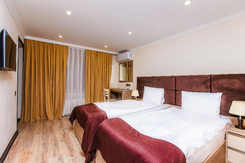 Deluxe City Hotel - Oda