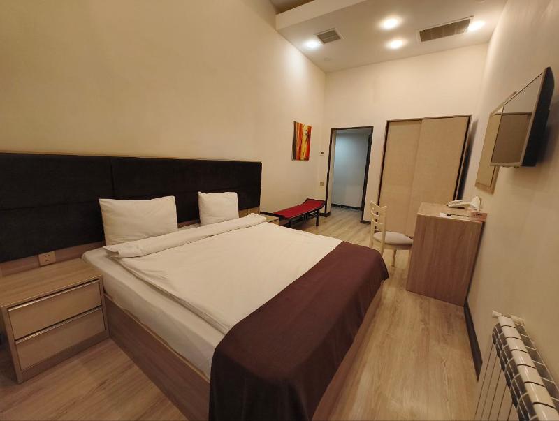 Deluxe City Hotel - Oda