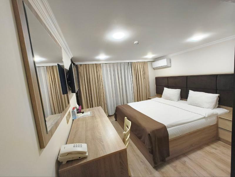 Deluxe City Hotel - Oda