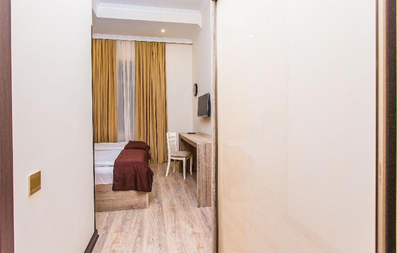 Deluxe City Hotel - Oda