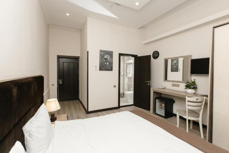 Deluxe City Hotel - Oda