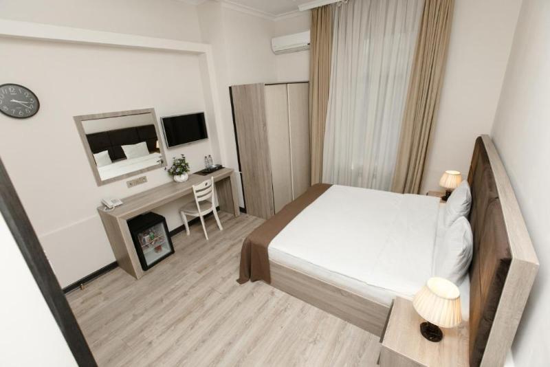 Deluxe City Hotel - Oda
