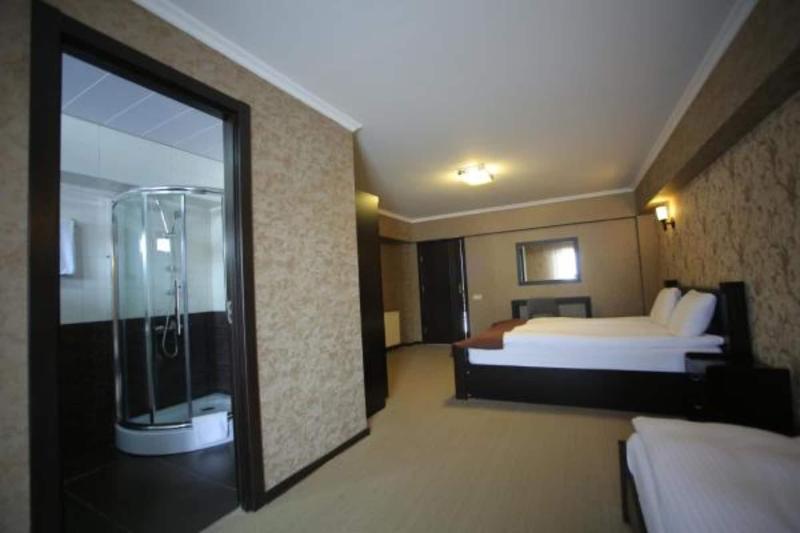 Good Aura Hotel - Oda