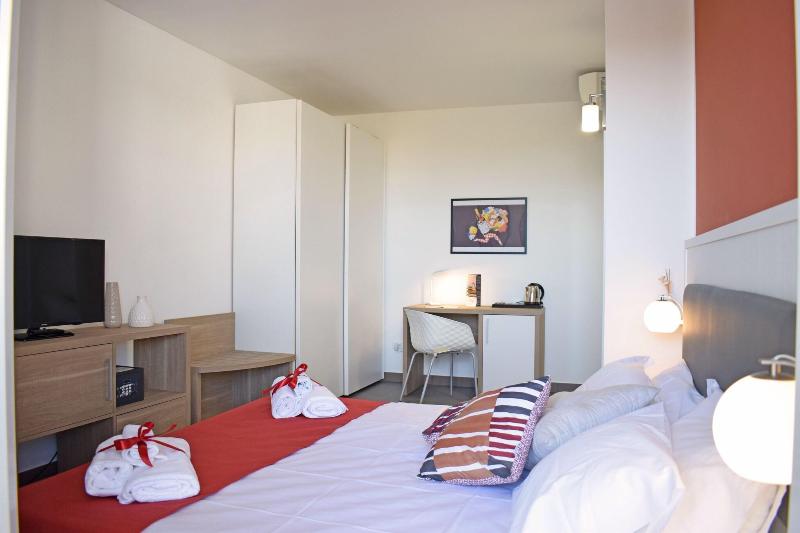 Travini Hotel Residence - Oda
