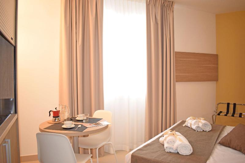 Travini Hotel Residence - Oda