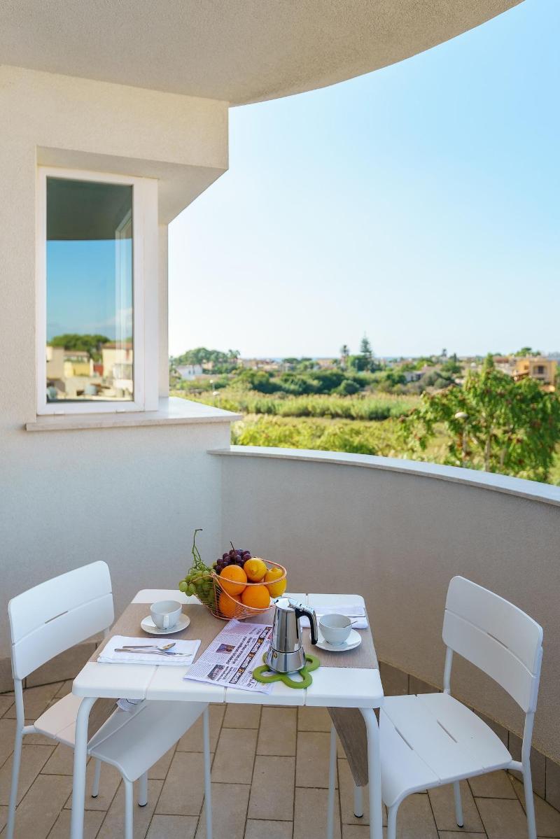 Travini Hotel Residence - Oda